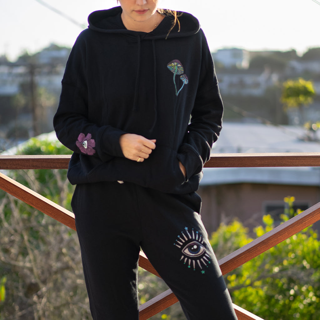 STAR EYE BURST BLACK SWEATPANTS